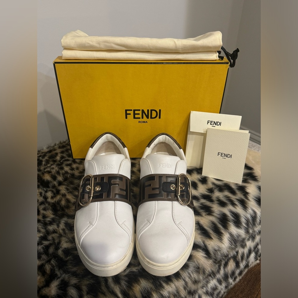 2021 FENDI sneakers,white with fendi logo brown leather strap with gold buckle.